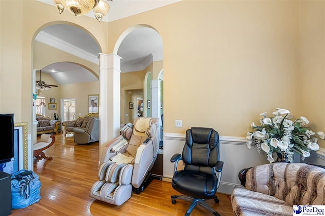 953 Rice Planters Ln, Florence, SC 29501 - sitting room featuring wood finished floors, arched walkways, ornamental molding, a ceiling fan, and ornate columns