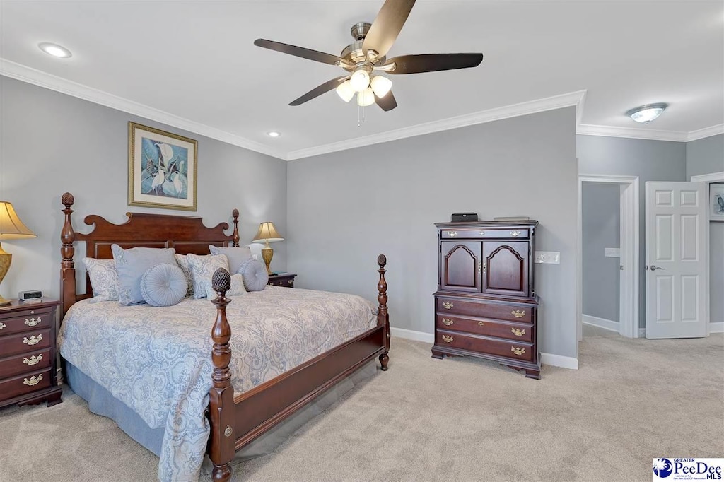 bedroom with ornamental molding, light colored carpet, and ceiling fan