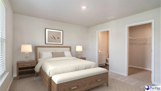 560 Strawberry Field Way, Galivants Ferry, SC 29544 - bedroom with a walk in closet, light colored carpet, a closet, and ensuite bathroom