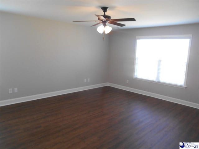 1081 Wessex Dr, Florence, SC 29501 - unfurnished room featuring baseboards, ceiling fan, and dark wood finished floors