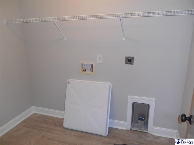 1081 Wessex Dr, Florence, SC 29501 - clothes washing area featuring laundry area, hookup for a washing machine, baseboards, and electric dryer hookup