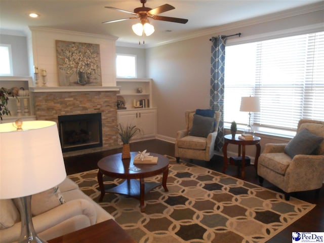 1081 Wessex Dr, Florence, SC 29501 - living area featuring ornamental molding, wood finished floors, a fireplace, baseboards, and ceiling fan