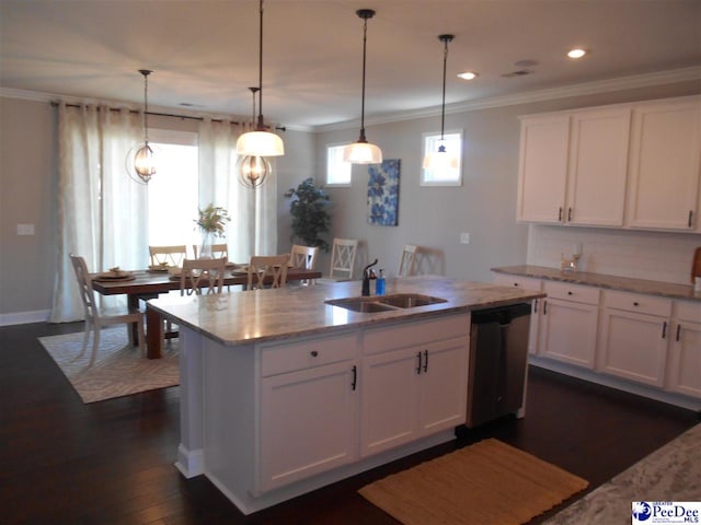 1081 Wessex Dr, Florence, SC 29501 - kitchen featuring light stone countertops, ornamental molding, stainless steel dishwasher, white cabinets, and a sink