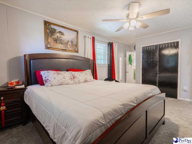 bedroom with dark colored carpet, ornamental molding, ceiling fan, and a textured ceiling