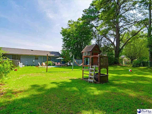 view of yard featuring a playground