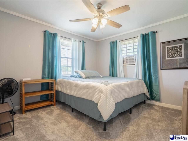 bedroom with crown molding, carpet flooring, and ceiling fan