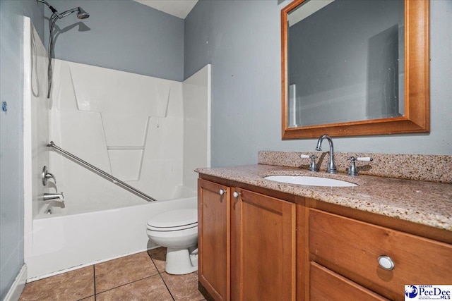 full bathroom featuring tile patterned flooring, vanity, bathtub / shower combination, and toilet