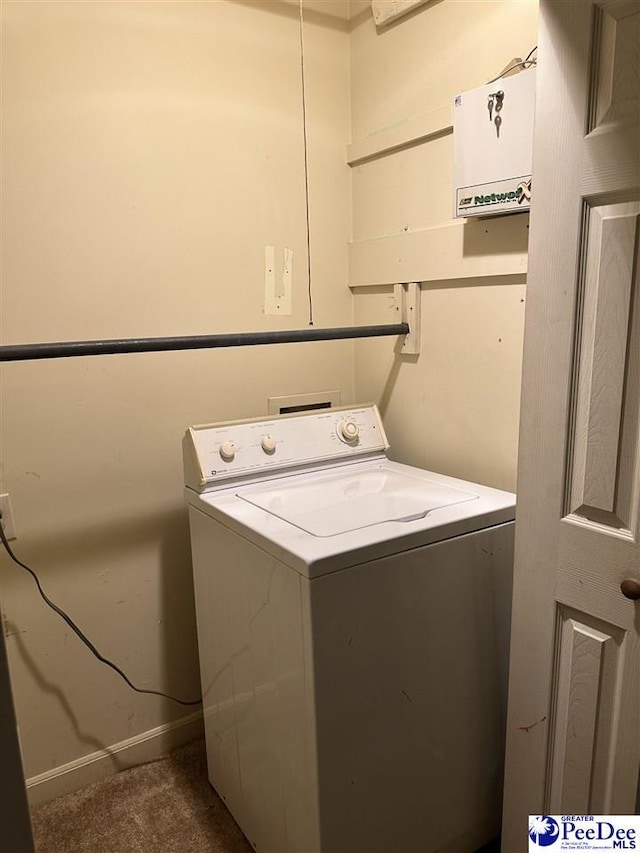 1824 Furman Dr, Florence, SC 29501 - laundry area with washer / clothes dryer, dark carpet, and baseboards