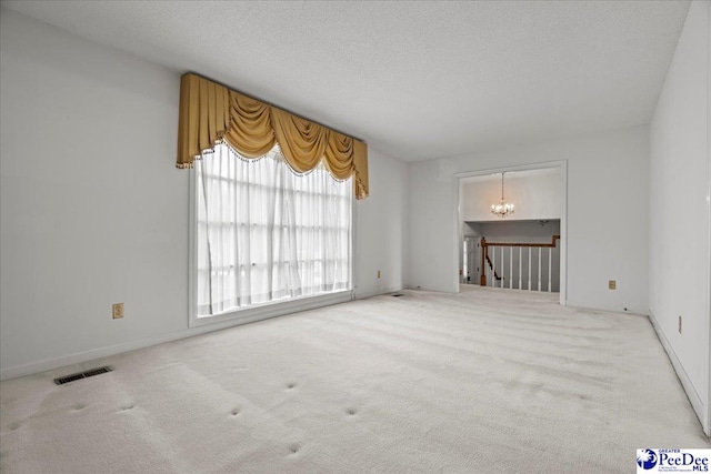 231 Timberlake Dr, Florence, SC 29501 - carpeted empty room with a chandelier