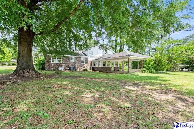 231 Timberlake Dr, Florence, SC 29501 - view of front of home featuring brick siding and a front yard
