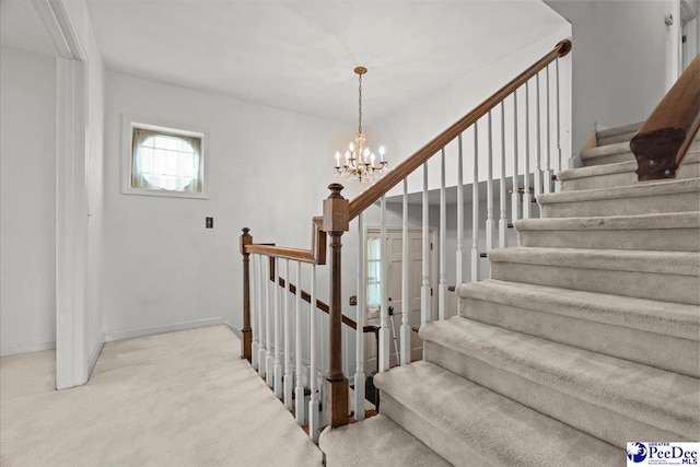 231 Timberlake Dr, Florence, SC 29501 - stairs with carpet and a chandelier