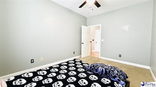2423 Ben Hogan Cir, Florence, SC 29506 - bedroom with light colored carpet, baseboards, ceiling fan, and vaulted ceiling