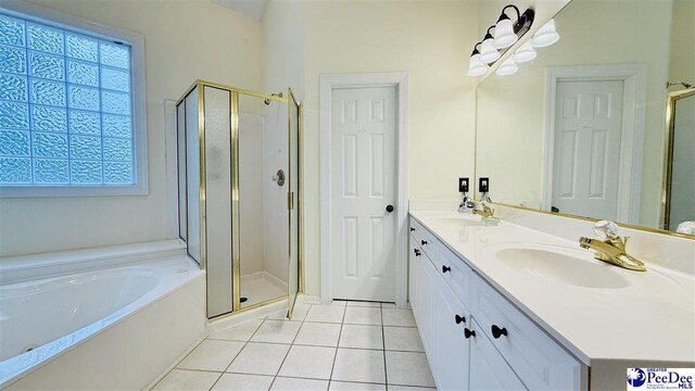 2423 Ben Hogan Cir, Florence, SC 29506 - full bathroom featuring tile patterned floors, a stall shower, and a garden tub