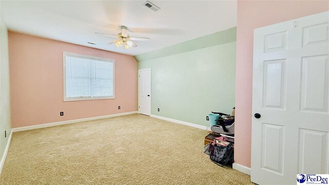 2423 Ben Hogan Cir, Florence, SC 29506 - spare room featuring carpet flooring, ceiling fan, and baseboards