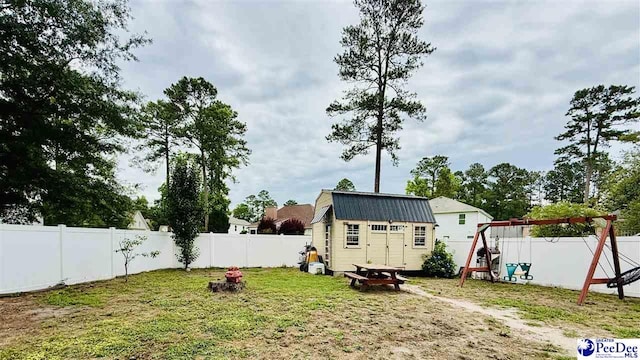 2423 Ben Hogan Cir, Florence, SC 29506 - view of yard with a playground, an outdoor structure, and a shed