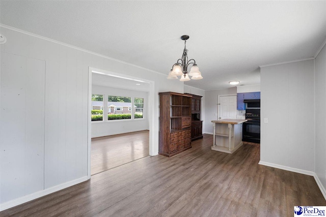 2206 W Piccadilly Dr, Florence, SC 29501 - kitchen featuring stove, a chandelier, dark wood finished floors, open shelves, and ornamental molding
