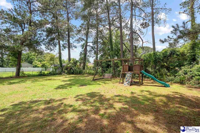 2206 W Piccadilly Dr, Florence, SC 29501 - view of yard featuring a playground