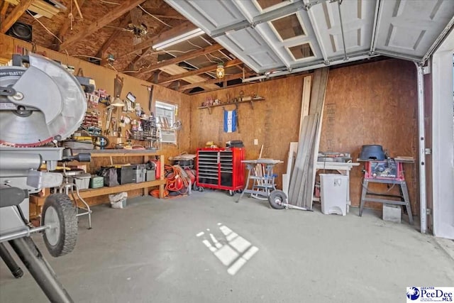 garage with a workshop area