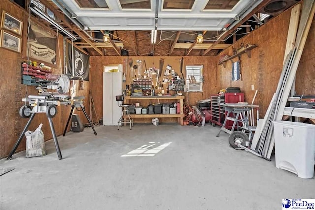 garage with a workshop area