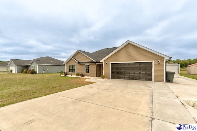 ranch-style home with a garage and a front lawn