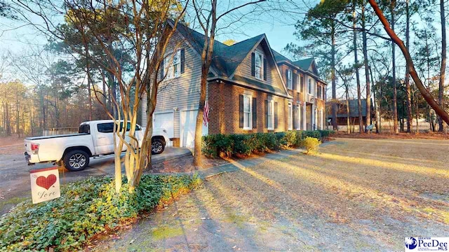 view of home's exterior with a garage