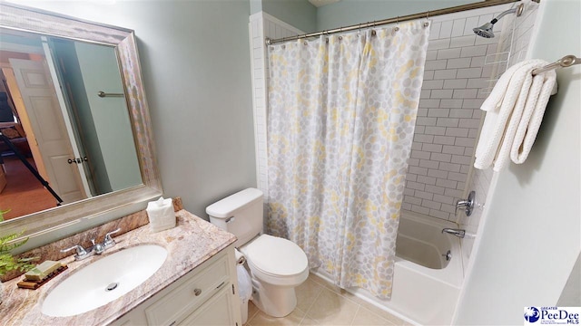 full bathroom featuring tile patterned flooring, vanity, toilet, and shower / bathtub combination with curtain