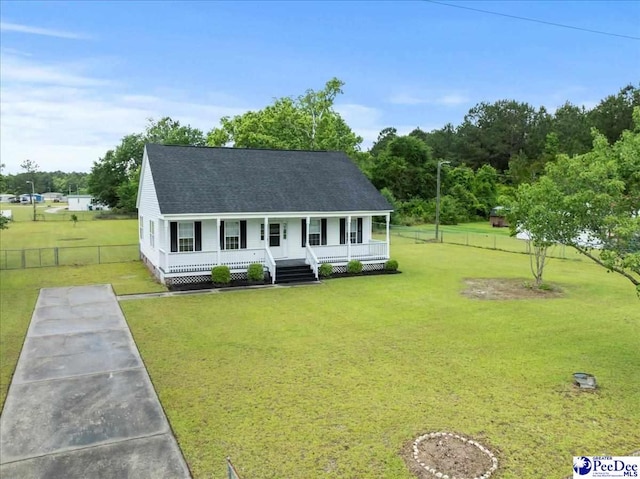1763 Lipscomb Rd, Mullins, SC 29574 - view of front of property featuring covered porch, a shingled roof, and driveway