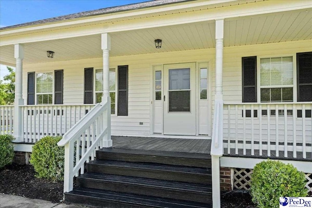 1763 Lipscomb Rd, Mullins, SC 29574 - property entrance with a porch