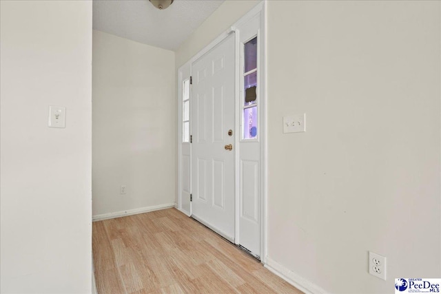 1763 Lipscomb Rd, Mullins, SC 29574 - foyer entrance with light wood finished floors and baseboards