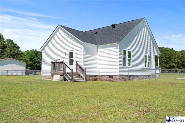 1763 Lipscomb Rd, Mullins, SC 29574 - back of house with crawl space and roof with shingles