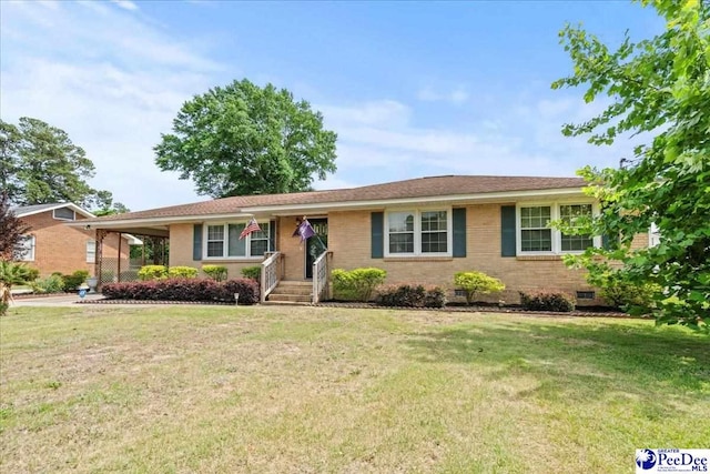 2810 Boxwood Ave, Florence, SC 29501 - ranch-style home featuring a front lawn and brick siding