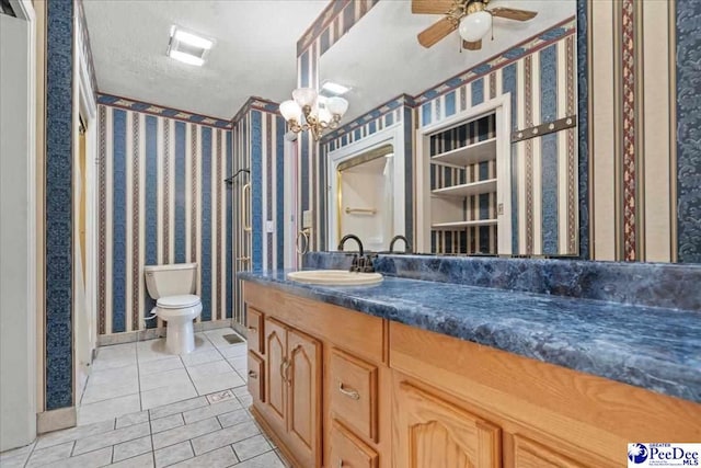 2810 Boxwood Ave, Florence, SC 29501 - full bath featuring tile patterned floors, toilet, ceiling fan, vanity, and a chandelier