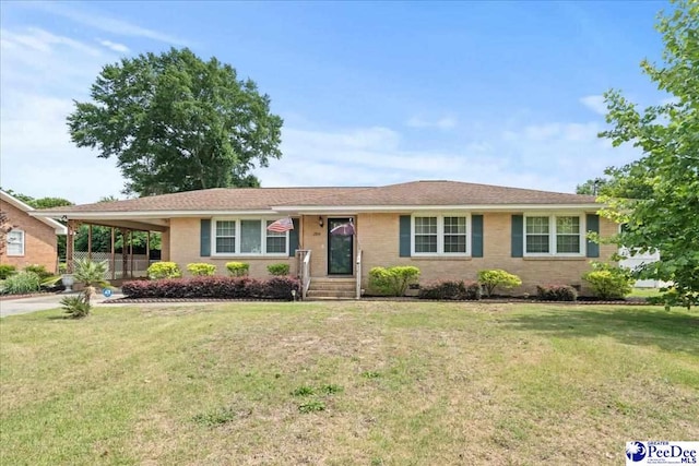 2810 Boxwood Ave, Florence, SC 29501 - ranch-style home with a carport, a front lawn, and driveway