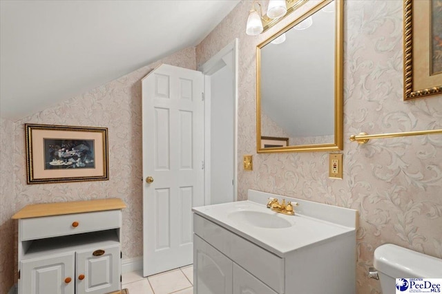 2284 Syracuse Community Rd, Darlington, SC 29532 - bathroom featuring lofted ceiling, wallpapered walls, vanity, toilet, and tile patterned floors