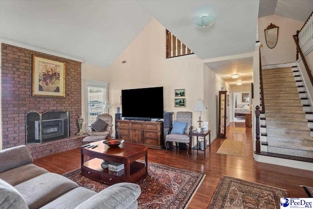 2284 Syracuse Community Rd, Darlington, SC 29532 - living area featuring high vaulted ceiling, stairs, wood finished floors, and a fireplace