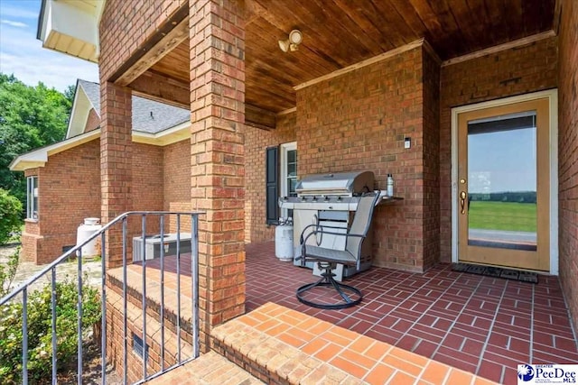 2284 Syracuse Community Rd, Darlington, SC 29532 - property entrance featuring a patio area and brick siding