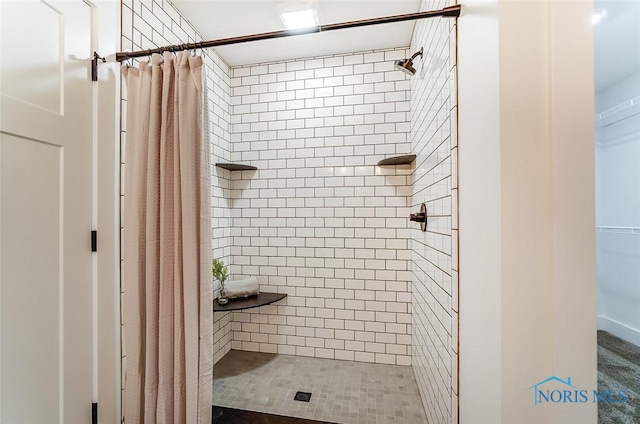 bathroom featuring walk in shower