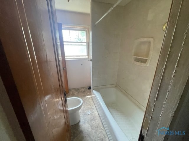 bathroom with toilet, tile flooring, and shower / bath combination