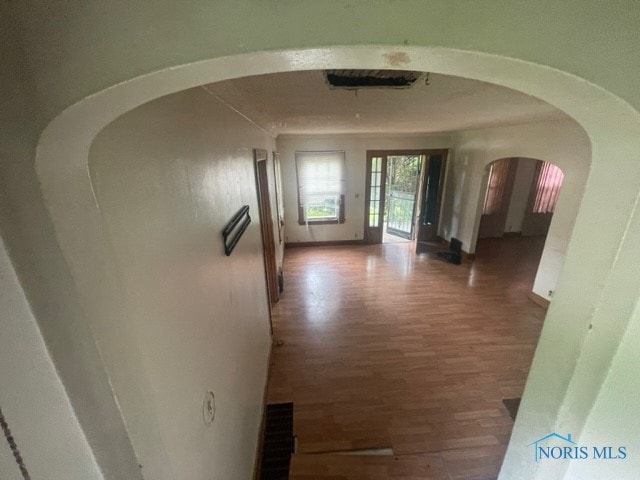 hall with dark wood-type flooring