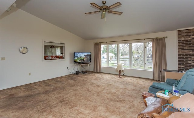 unfurnished living room featuring ceiling fan, carpet floors, and vaulted ceiling