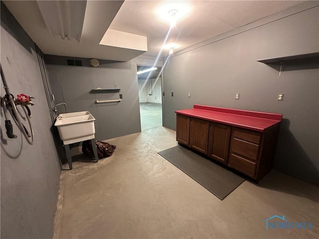 bathroom with concrete floors