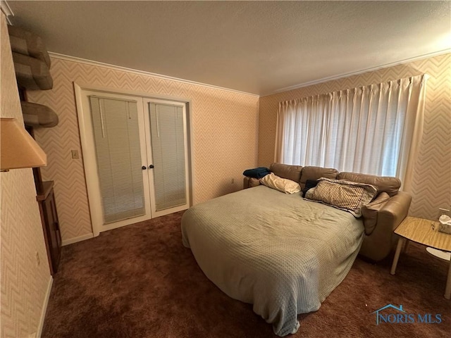 carpeted bedroom featuring crown molding