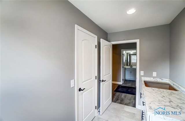 interior space featuring tile floors and vanity