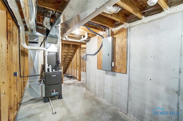 basement featuring heating utilities