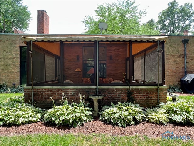 exterior space with a sunroom