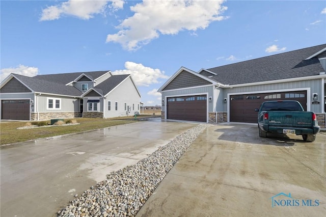 craftsman house with a garage