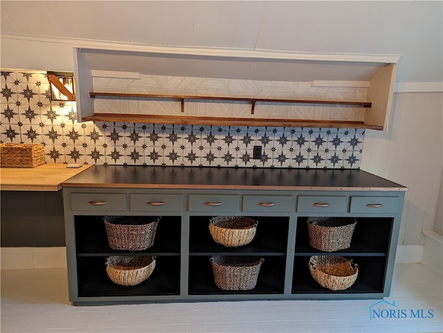 interior space featuring tasteful backsplash