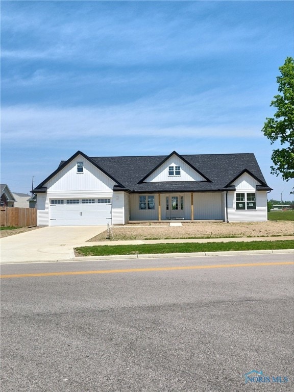 ranch-style home featuring a garage