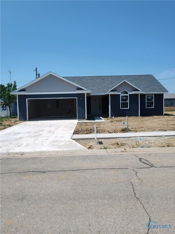 single story home with a garage