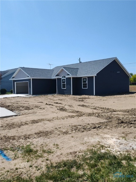 exterior space with a garage